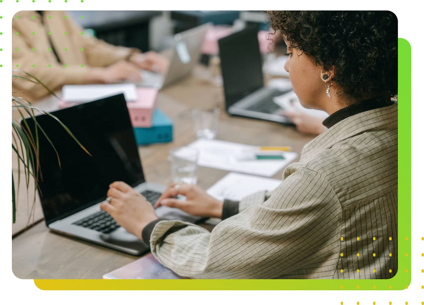 A woman pressing a laptop