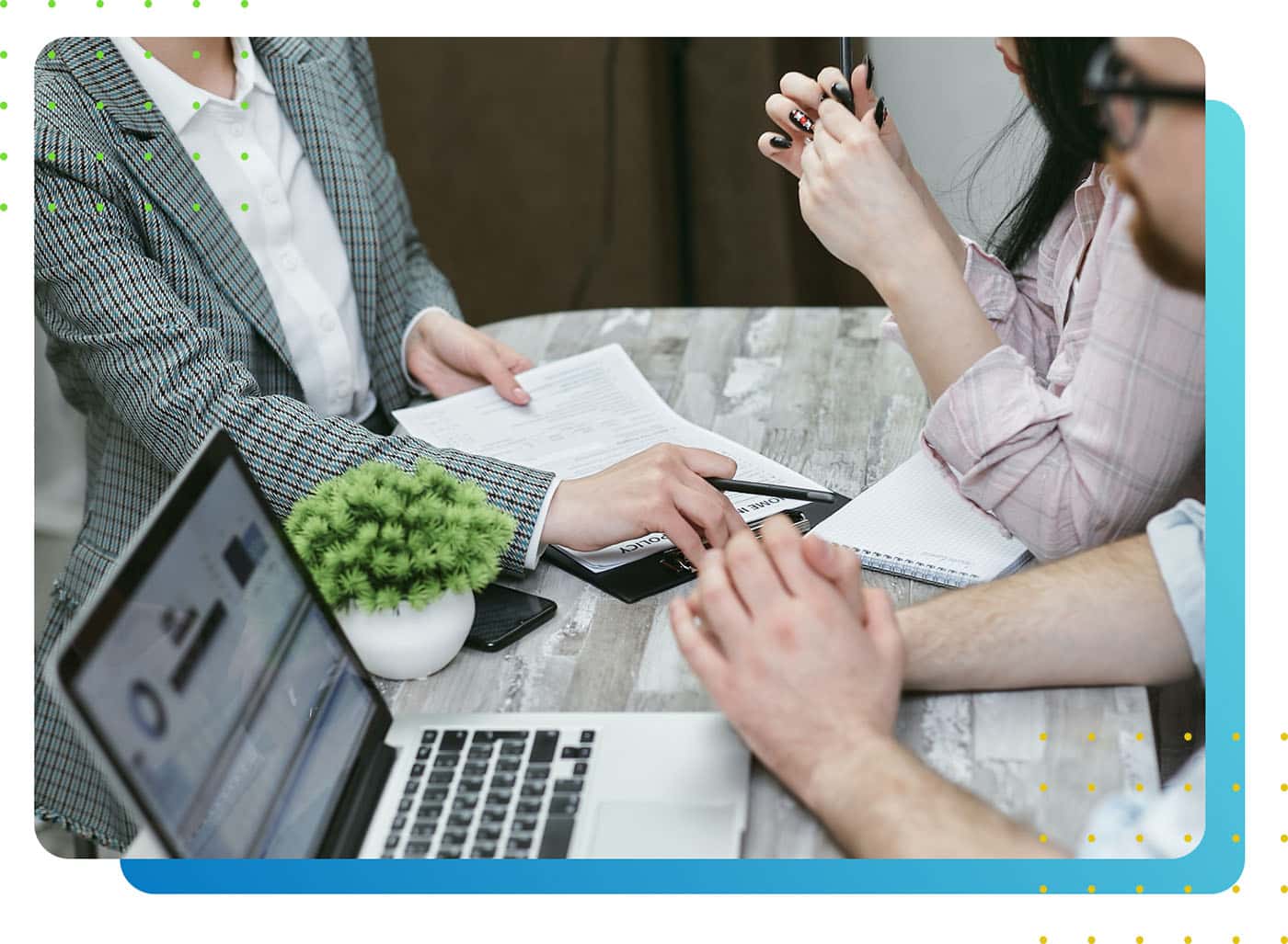 Crop image of three people discussing while sitting